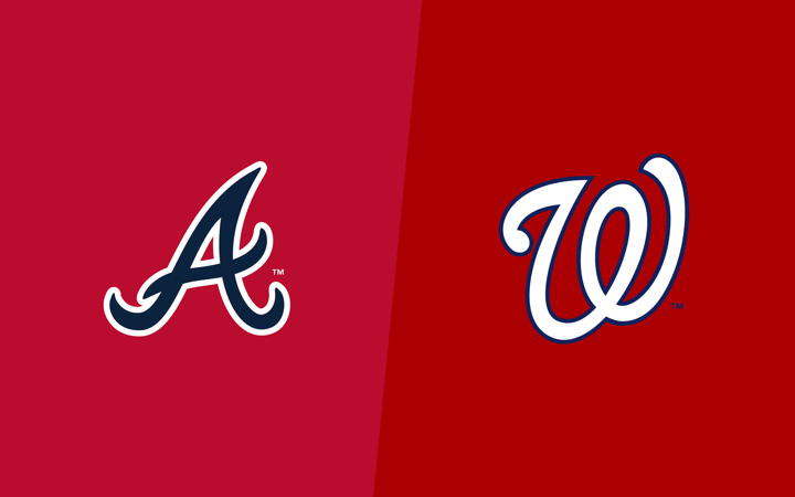 Members of the Washington Nationals hold up national flags to celebrate Hispanic  Heritage Day before a baseball game between the Atlanta Braves and the  Washington Nationals at Nationals Park, Thursday, Sept. 21