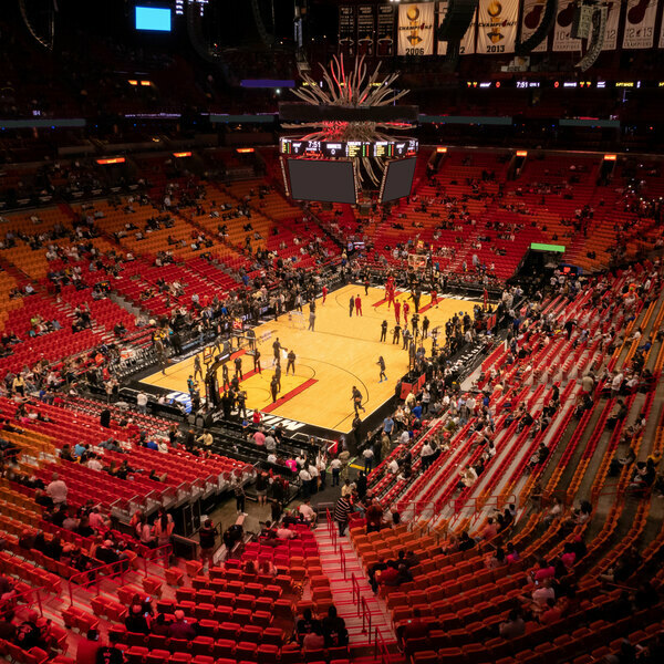 Who is the woman sitting courtside with Heat dress? How opera